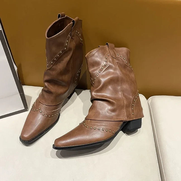 Women's studded western boots, mid-calf, edgy fashion, pointed toe, and durable block heel.