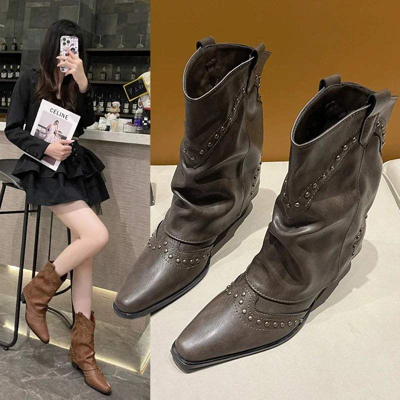 Edgy studded cowgirl boots for women, pointed toe, comfortable block heel. Trendy footwear.