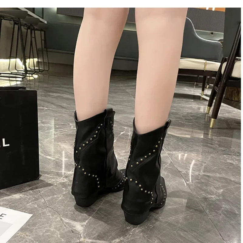 Studded mid-calf boots for women, western fashion, featuring a chic pointed toe and block heel.
