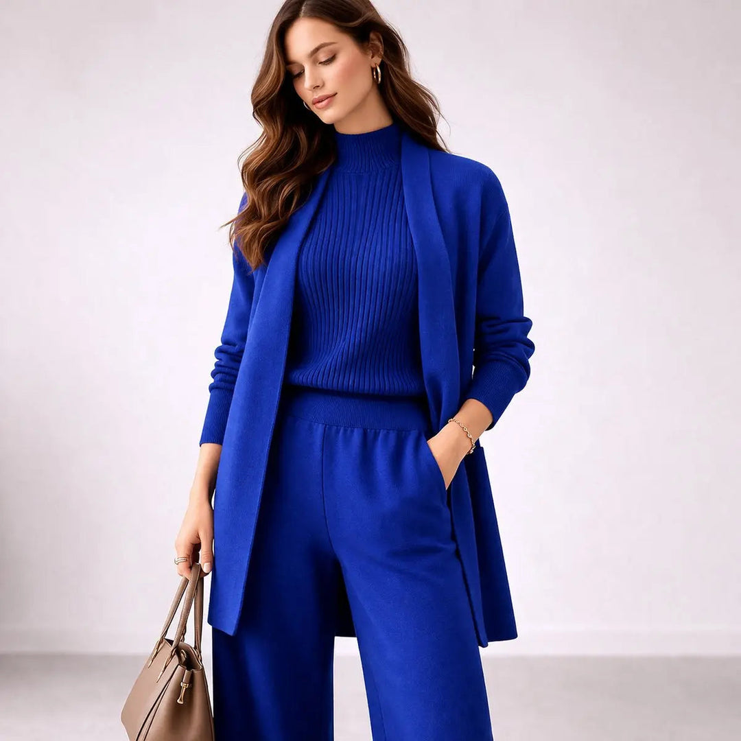 Women's comfortable three-piece co-ord set featuring a long cardigan and flowy wide-leg trousers. Relaxed fit.