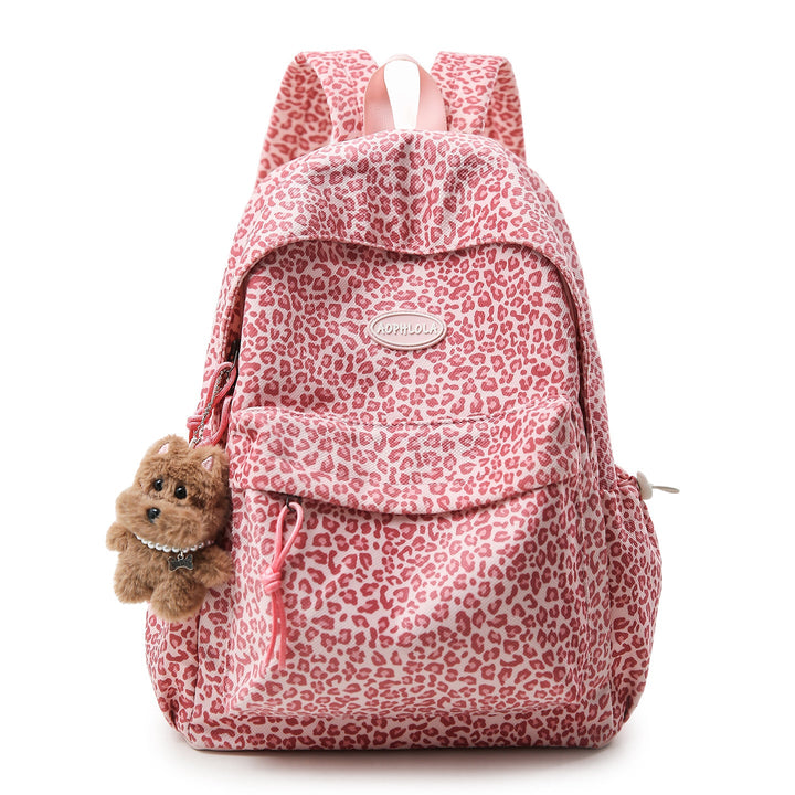 Trendy leopard print school backpack for women, spacious and organized for books, laptop, and travel essentials.