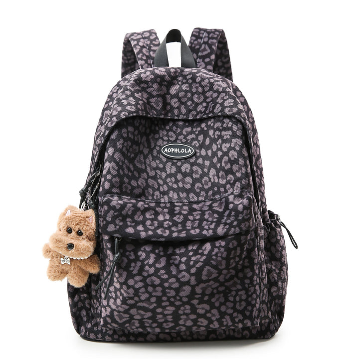 Chic animal print women's school bag. Features multiple pockets for organized storage, great for students & travel.
