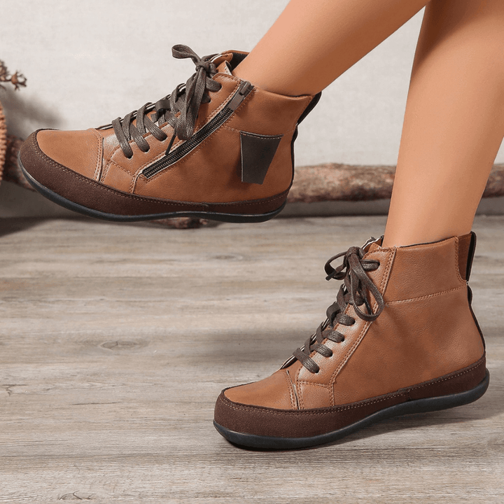 Women's stylish ankle boots with easy side zipper, round toe, perfect for versatile fall & winter fashion.