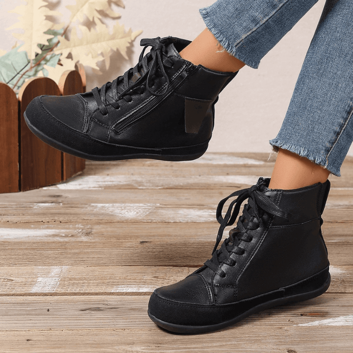 Chic brown women's ankle boots with side zipper, comfortable for everyday fall & winter outfits.