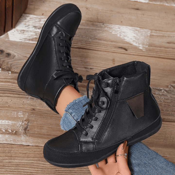 Fashionable women's ankle boots featuring convenient side zipper, ideal for stylish fall & winter footwear.