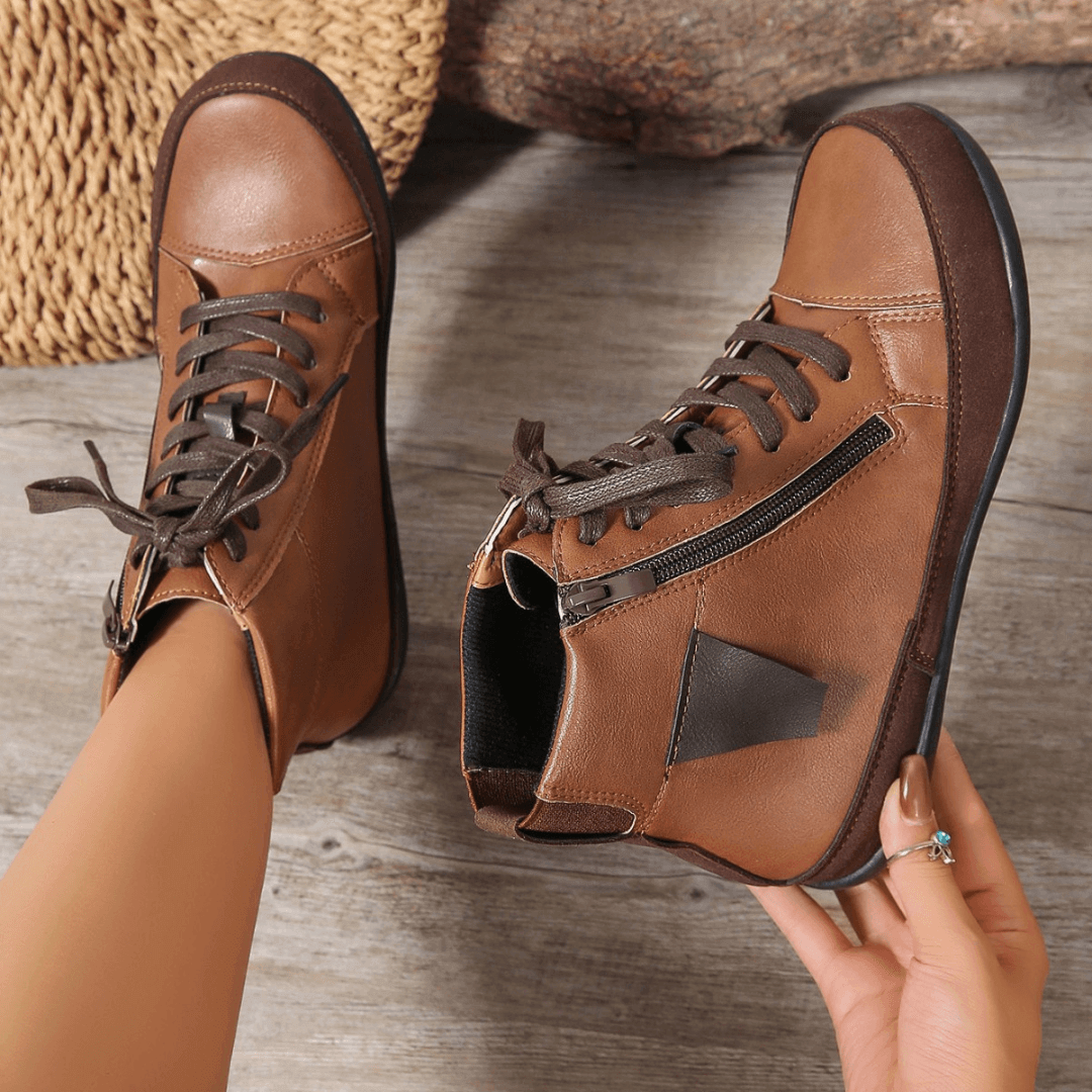 Elegant women's ankle boots with easy side zipper, perfect stylish choice for comfortable fall/winter wear.