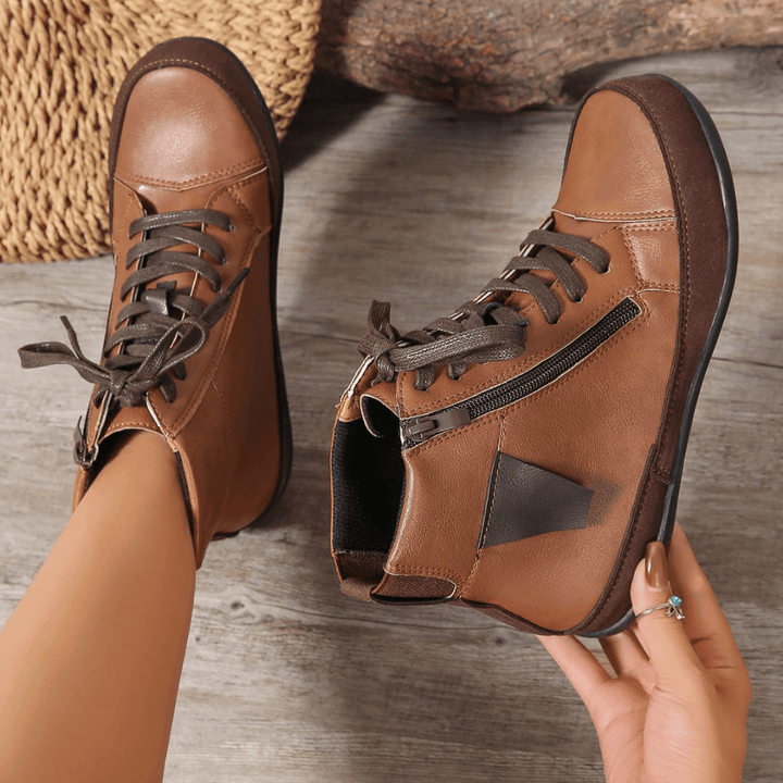 Elegant women's ankle boots with easy side zipper, perfect stylish choice for comfortable fall/winter wear.
