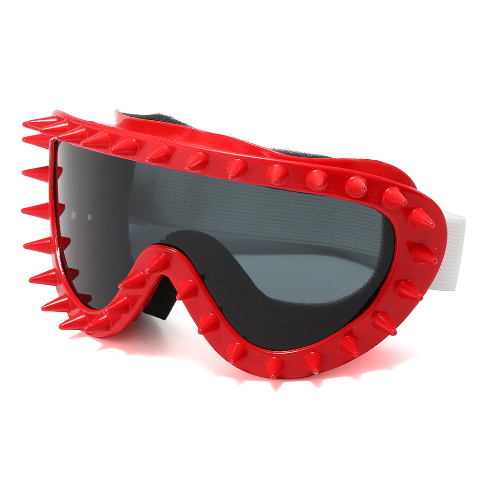 Stylish black women's goggles with unique spike detailing for fashion & eye safety.