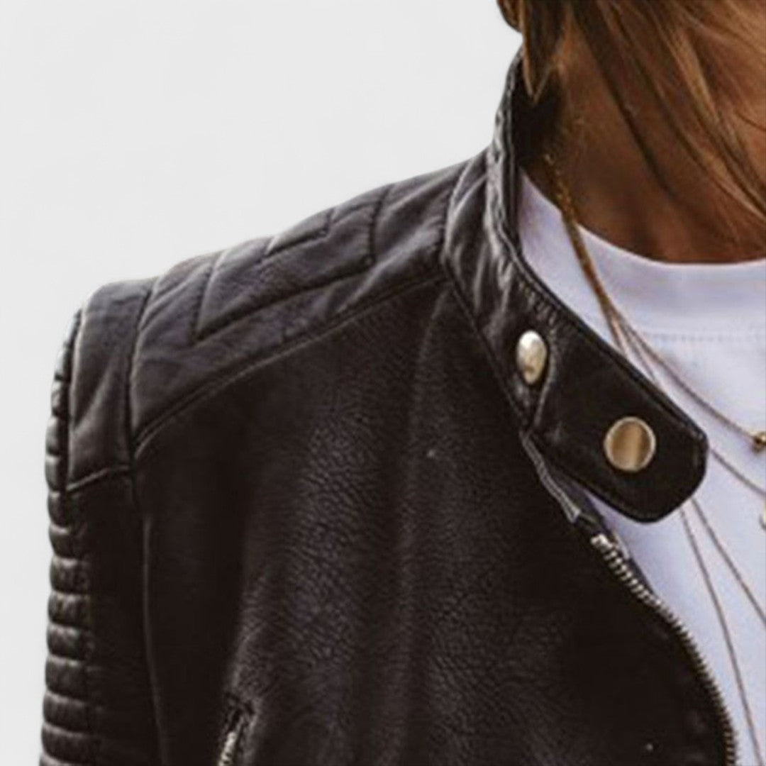 Fitted women's black zippered jacket with a sleek stand collar. Versatile stylish outerwear for women.
