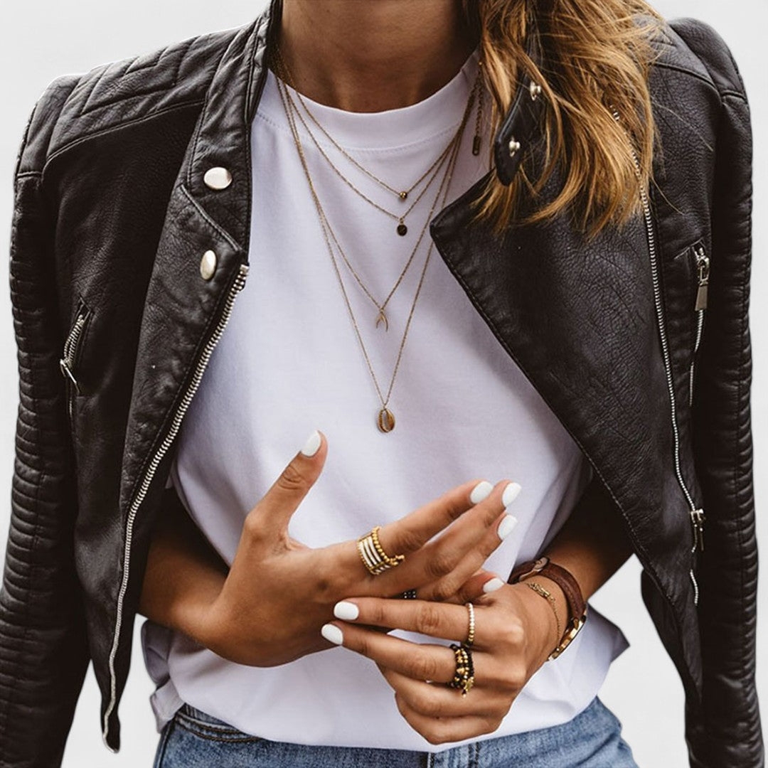 Stylish women's black jacket featuring a stand collar & zipper closure. Essential spring/autumn fashion outerwear.