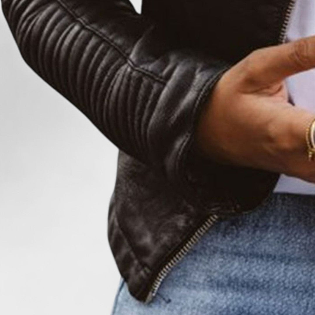 Elegant black women's zippered jacket with a stand collar. A fitted & stylish outerwear piece for modern women.
