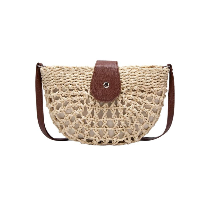 Women's stylish braided straw crossbody bag, perfect for summer. Lightweight and natural.