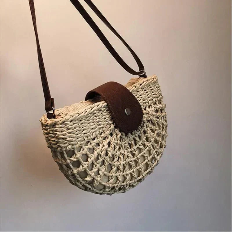 Women's elegant braided straw shoulder bag, a natural & lightweight choice for summer outfits.