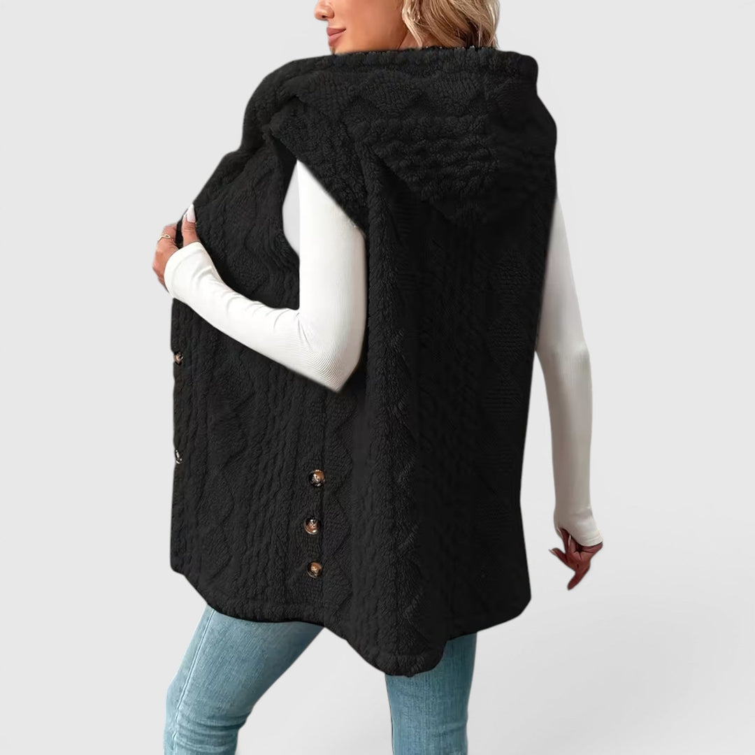 Versatile women's hooded vest outerwear, button-front for effortless layering.