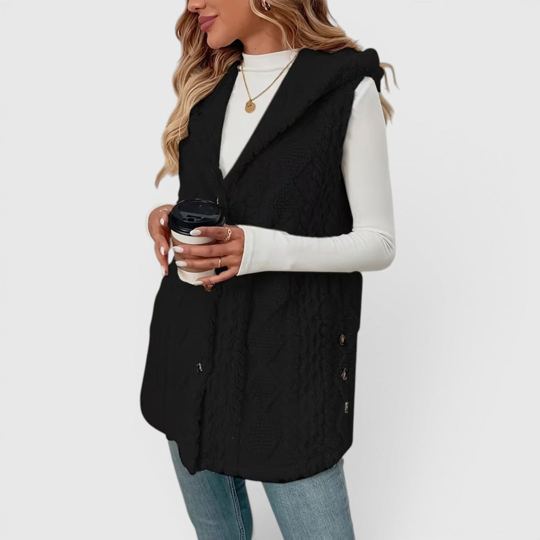 Chic women's button-front hooded vest, perfect for adding cozy style to outfits.