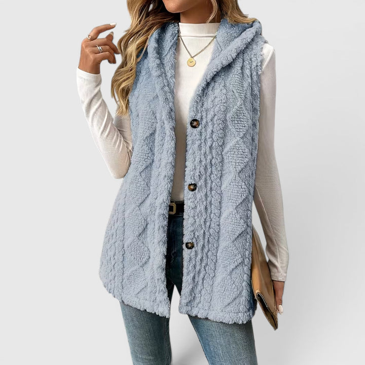 Women's stylish hooded vest, button-front detail, ideal for chic layering.