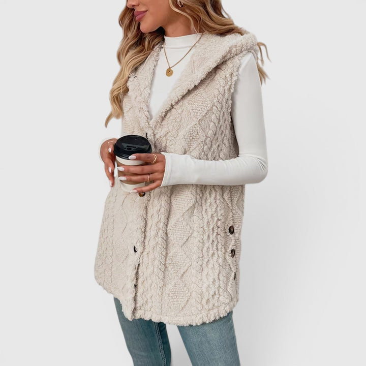 Casual chic women's hooded vest outerwear, ideal for layering outfits.