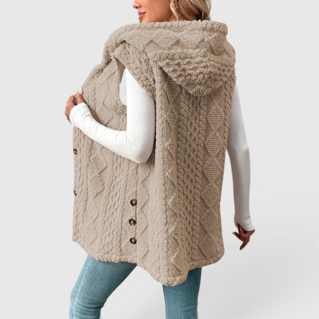 Women's hooded outerwear vest, button-front for a chic & versatile look.