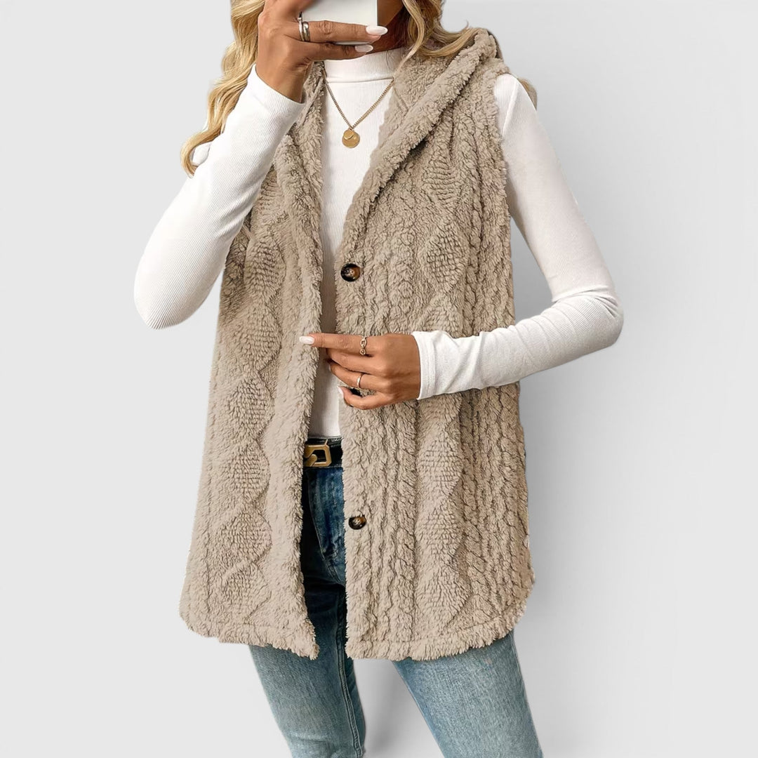 Cozy women's hooded vest, button-up, great for layering & transitional weather.