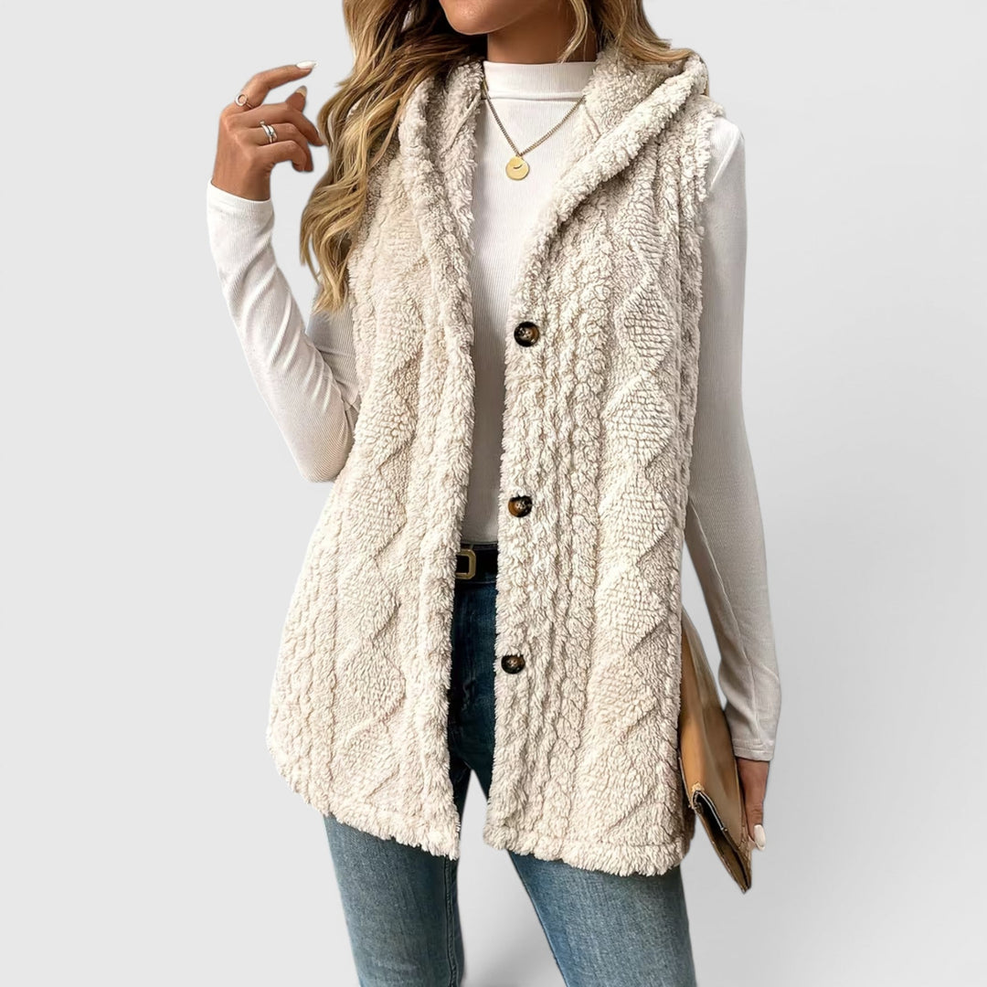Women's layering vest, hooded & button-front, perfect for casual chic style.