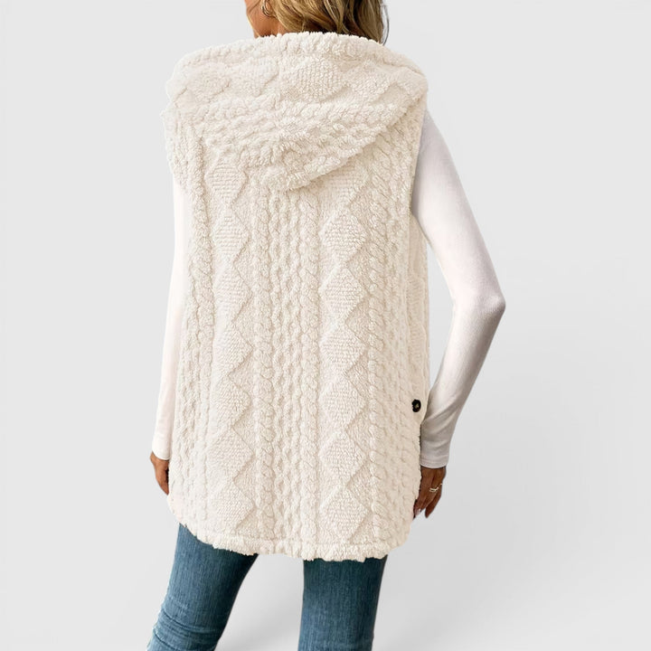 Women's sleeveless hooded vest outerwear, chic & warm with front buttons.