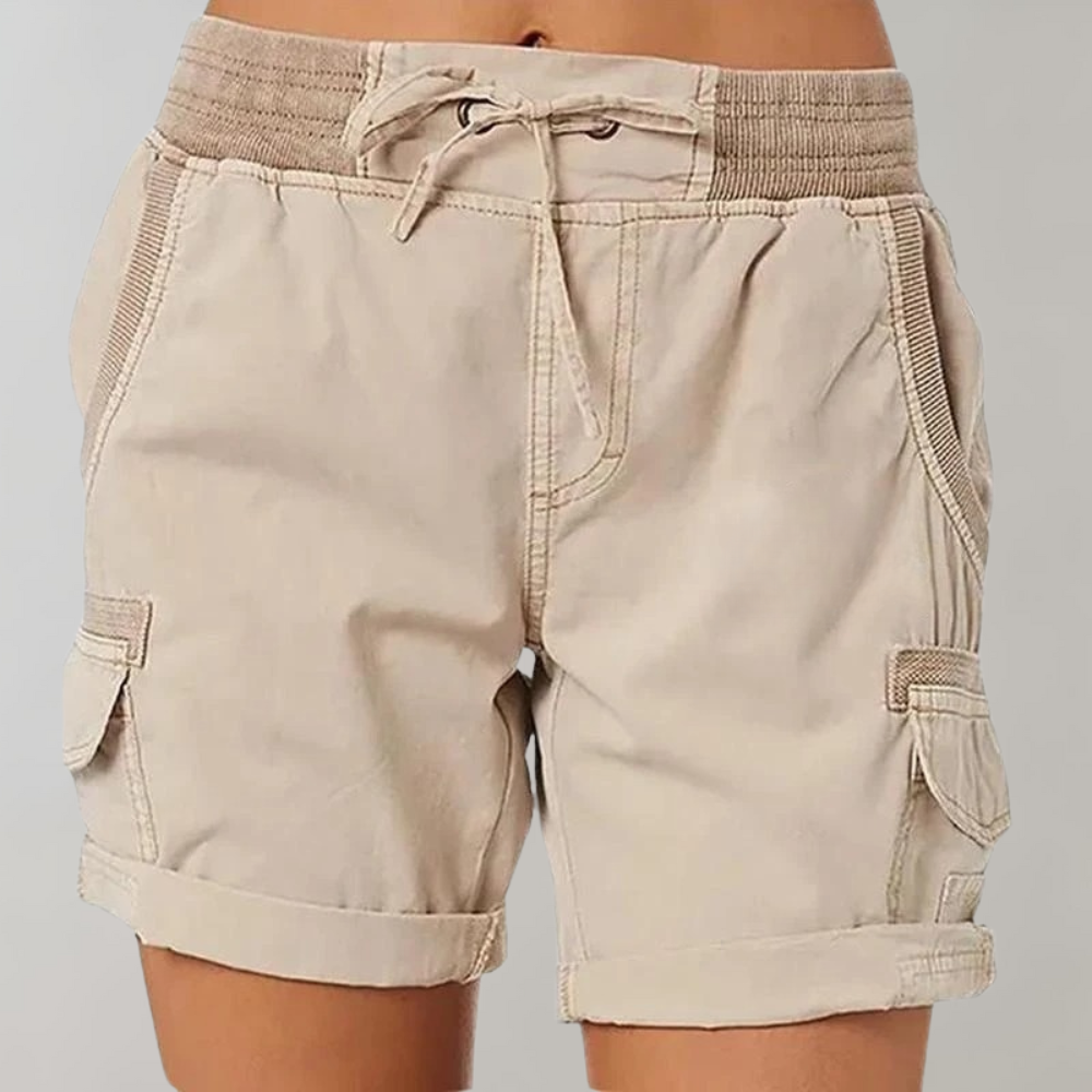 Travel-friendly women's utility cargo shorts. Comfortable, featuring an elastic drawstring waist & multiple pockets.