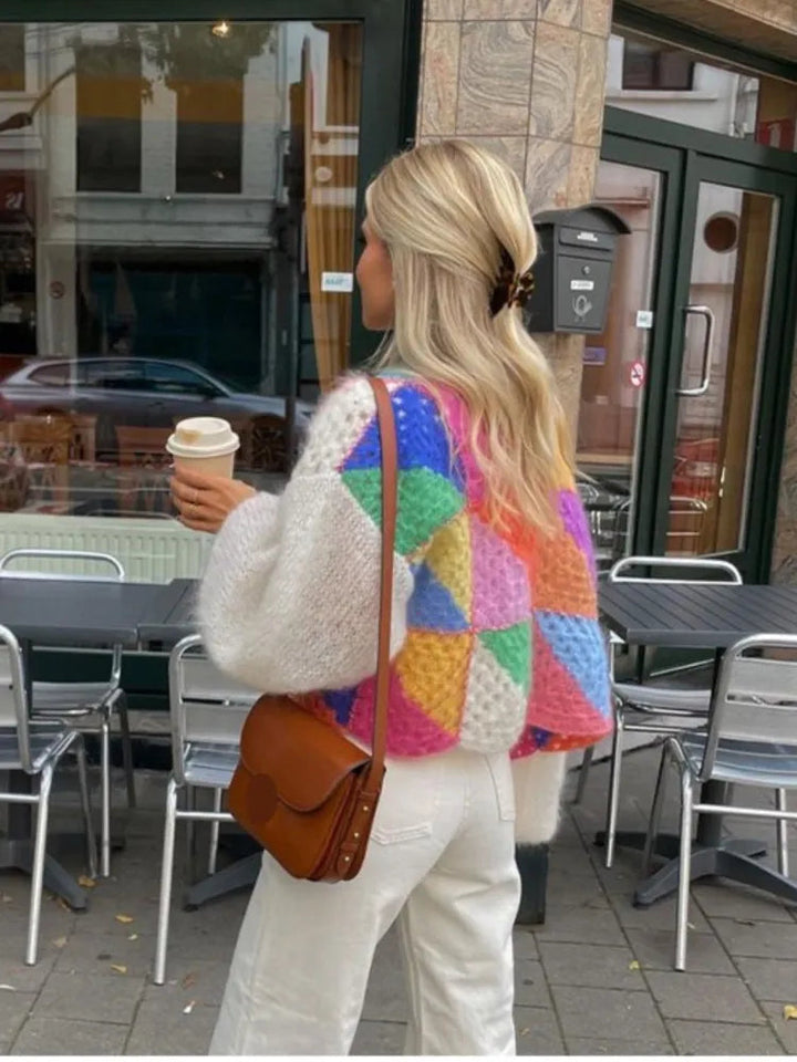 Women's stylish color-blocked cropped sweater. Cozy long sleeve knit top, perfect for spring casual outfits.