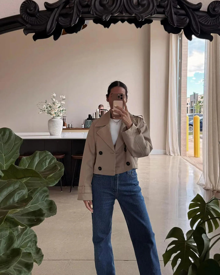 Chic coffee double-breasted short trench coat for women. Stylish outerwear, great for spring/fall fashion.