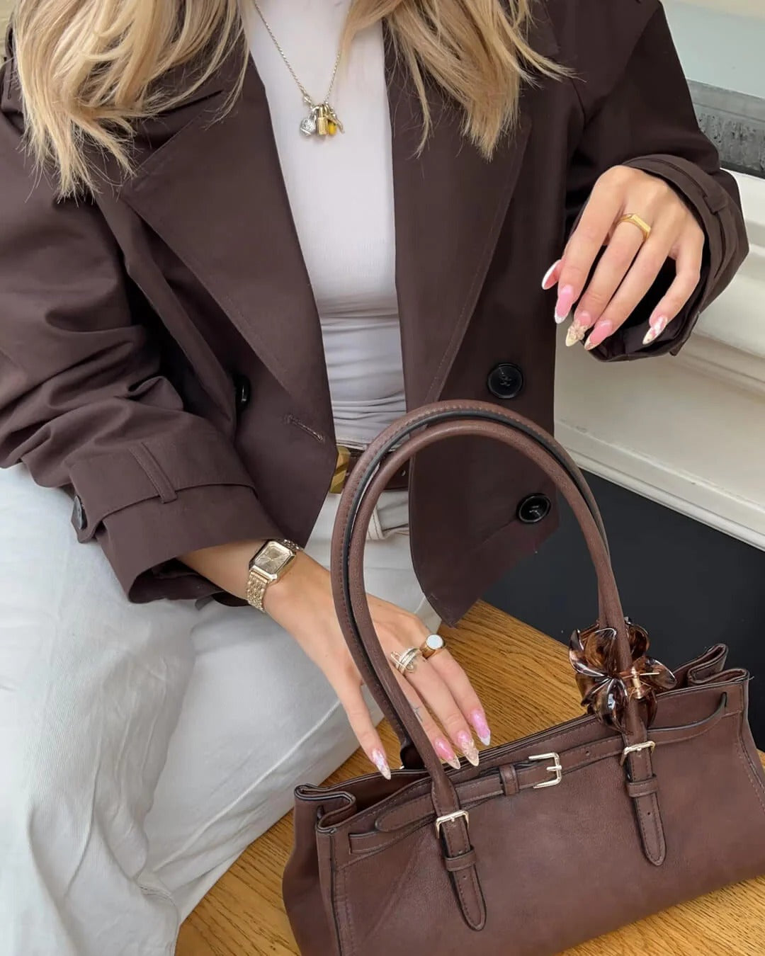 Stylish women's double-breasted short trench, durable and chic for everyday spring/autumn wear.