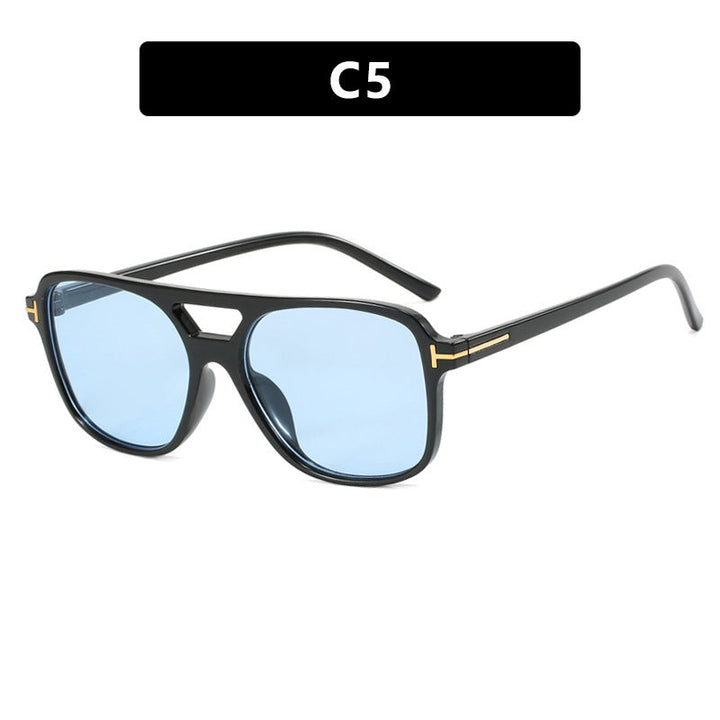 Stylish women's sunglasses with a sleek frame, perfect for adding a chic touch & UV safety.