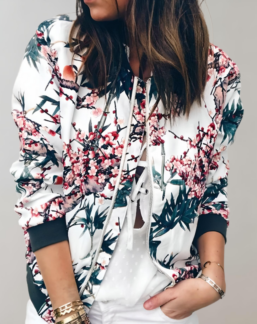 Women's stylish floral bomber jacket with a vibrant pattern, perfect for spring casual chic outerwear.