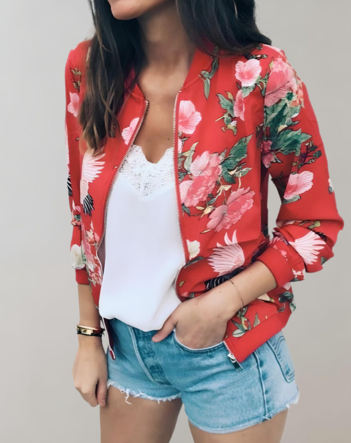 Elegant women's patterned floral bomber jacket, a stylish and lightweight spring jacket for casual chic looks.