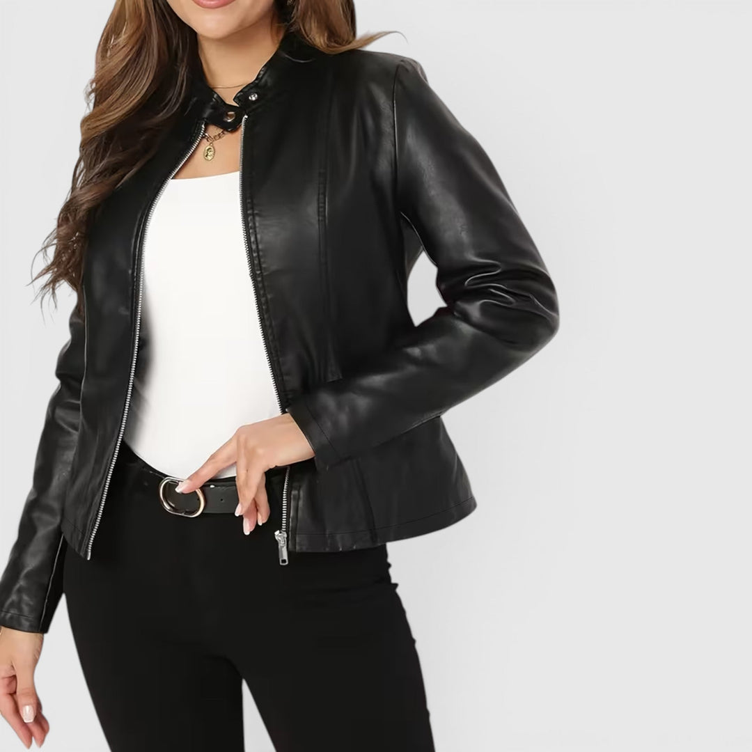 Sleek women's full zip jacket featuring a stand collar. Elegant and versatile for all-season outerwear.