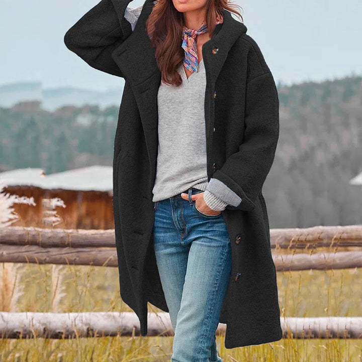 Fashionable hooded winter coat for women, offering warmth and casual, cozy style