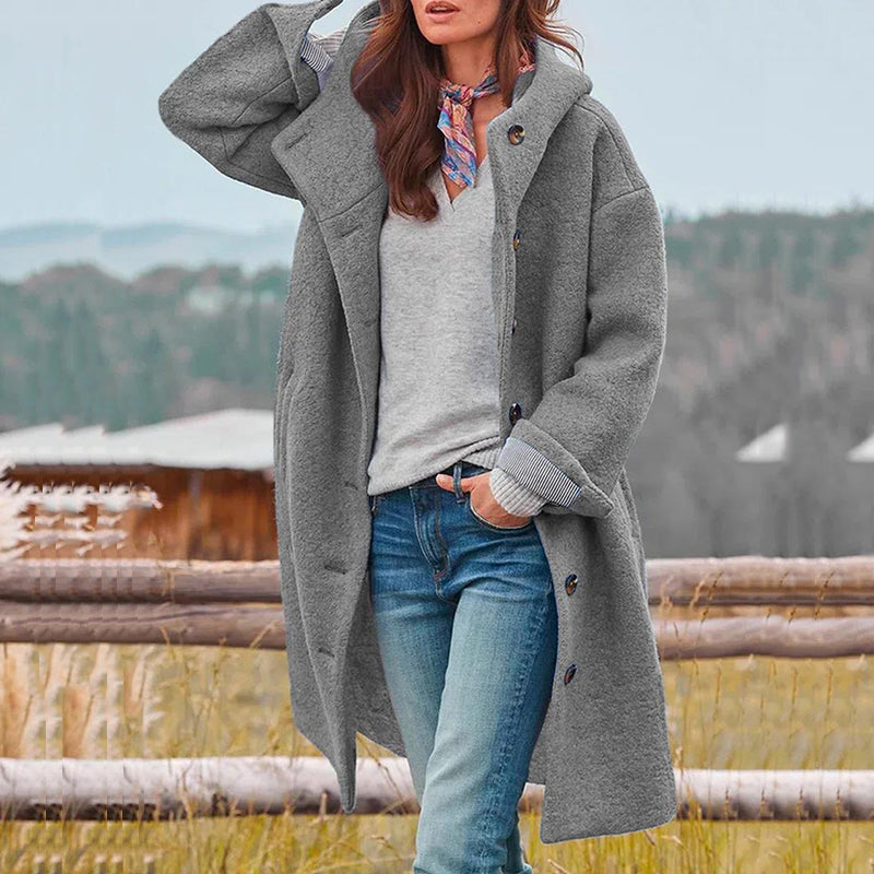 Warm and cozy women's long coat with a hood, ideal for casual winter fashion