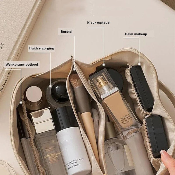 Elegant women's leather makeup organizer bag, keeping cosmetic essentials neatly stored for home or travel use.
