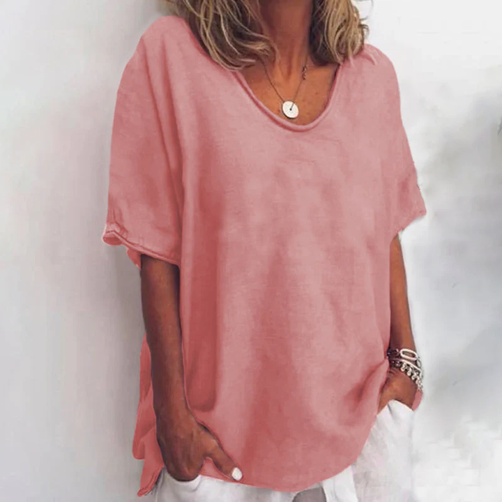 Stylish women's everyday blouse, loose fit for comfort, providing flattering tummy coverage.