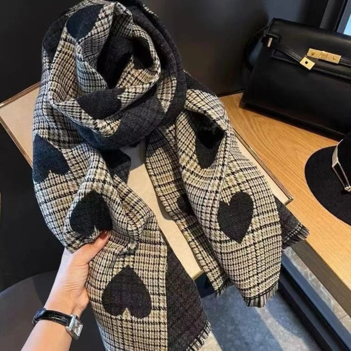 Elegant women's reversible plaid scarf featuring Mickey Mouse. Warm winter accessory with fringed edges.