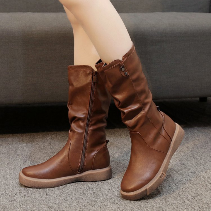 Women's stylish mid-calf boots with convenient side zipper, perfect for casual autumn and winter outfits.