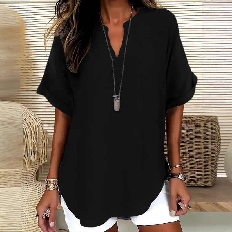 Versatile women's mid-sleeve V-neck blouse, great for everyday casual wear or office attire.