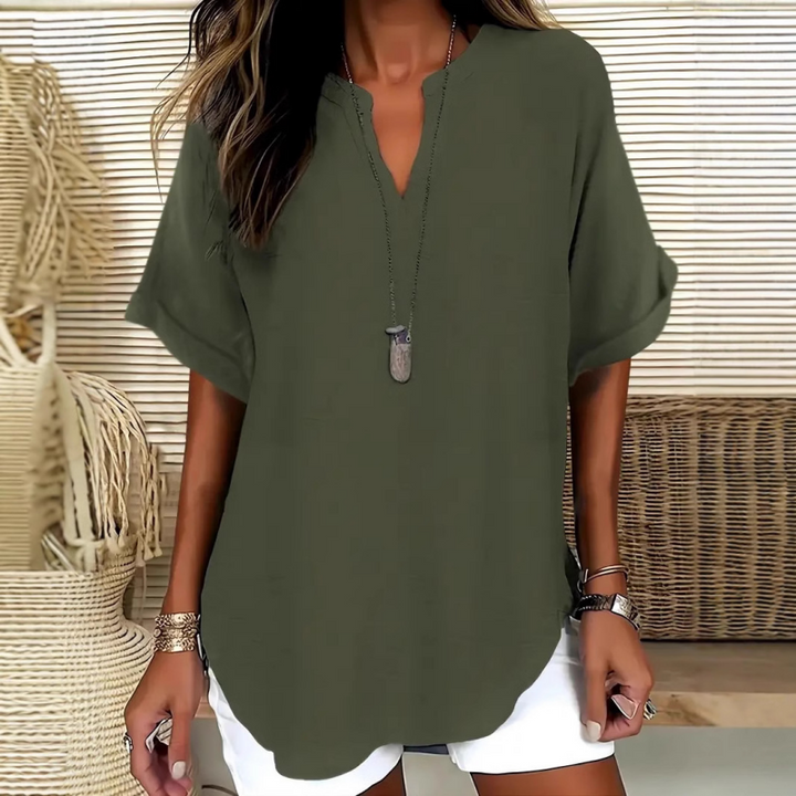 Chic women's mid-sleeve V-neck blouse, suitable for spring, summer, office, or casual outings.