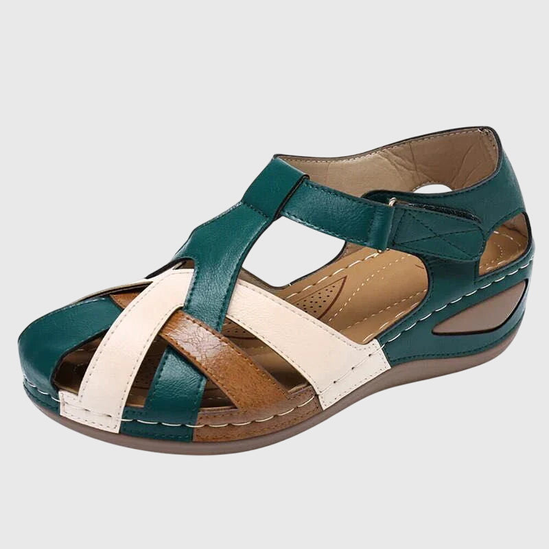 Elegant women's comfort sandals with supportive arch & adjustable straps, ideal for all-day relief.