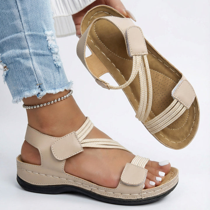 Women's travel-friendly orthopedic sandals, offering stylish comfort and arch support for long walks.