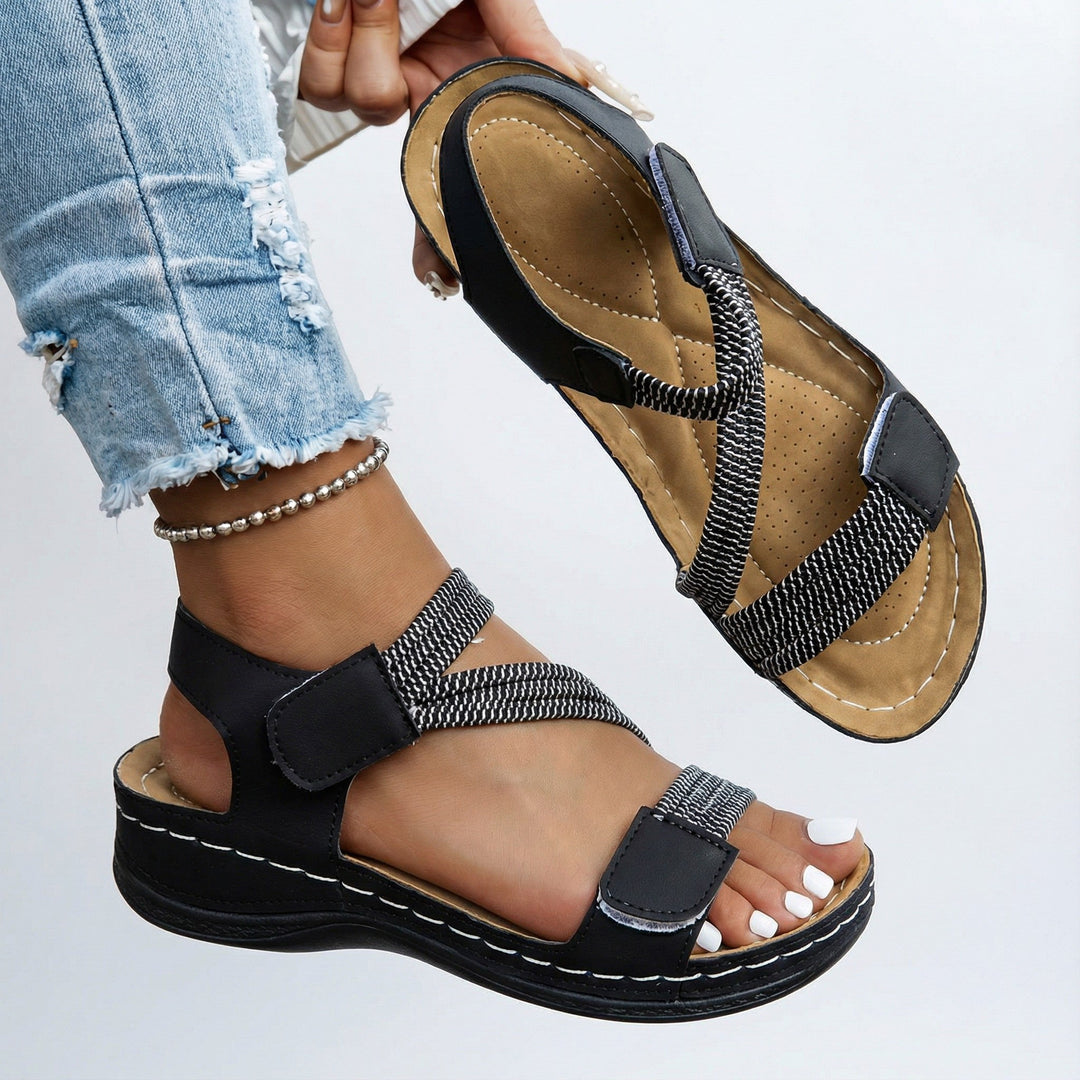 Versatile women's orthopedic sandals in a sleek design, offering foot support & comfort for stylish everyday wear.