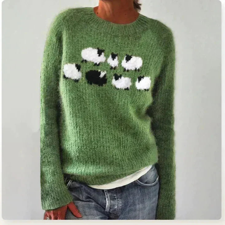 Cozy women's patterned long-sleeve jumper, a stylish winter essential with a comfortable wide neckline.