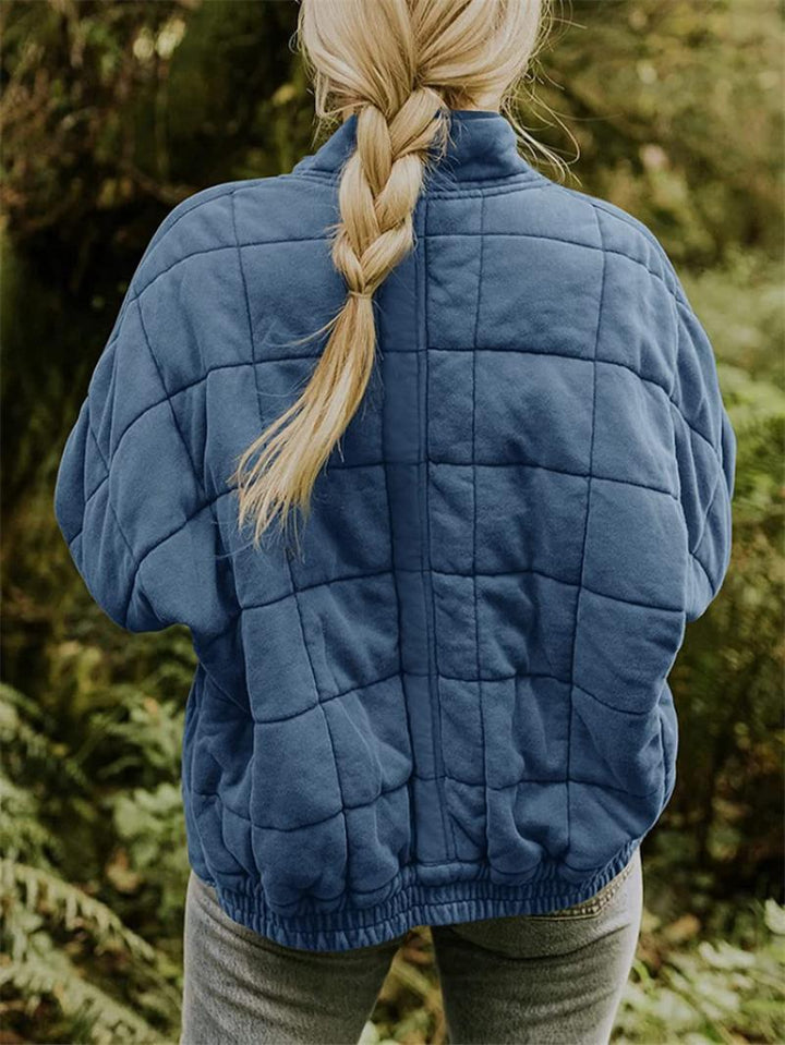 Comfortable women's quilted bomber jacket. Zip-up, stylish for autumn/spring casual and everyday wear.