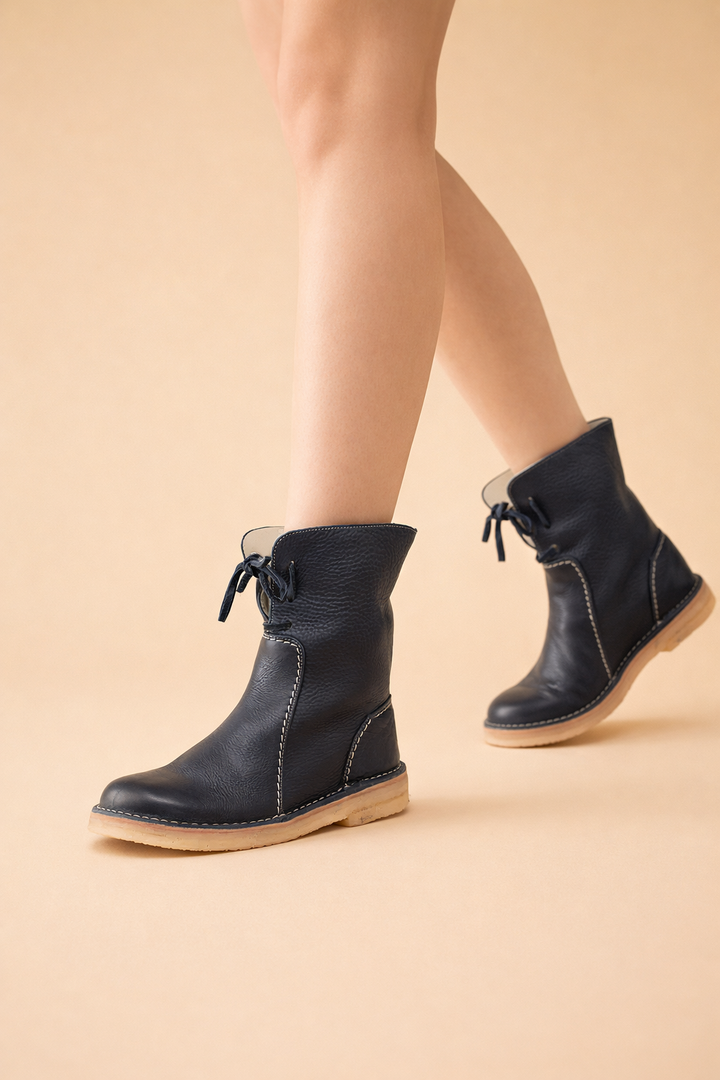 Chic women's short snow boots, providing warmth & style for winter fashion, casual outings.