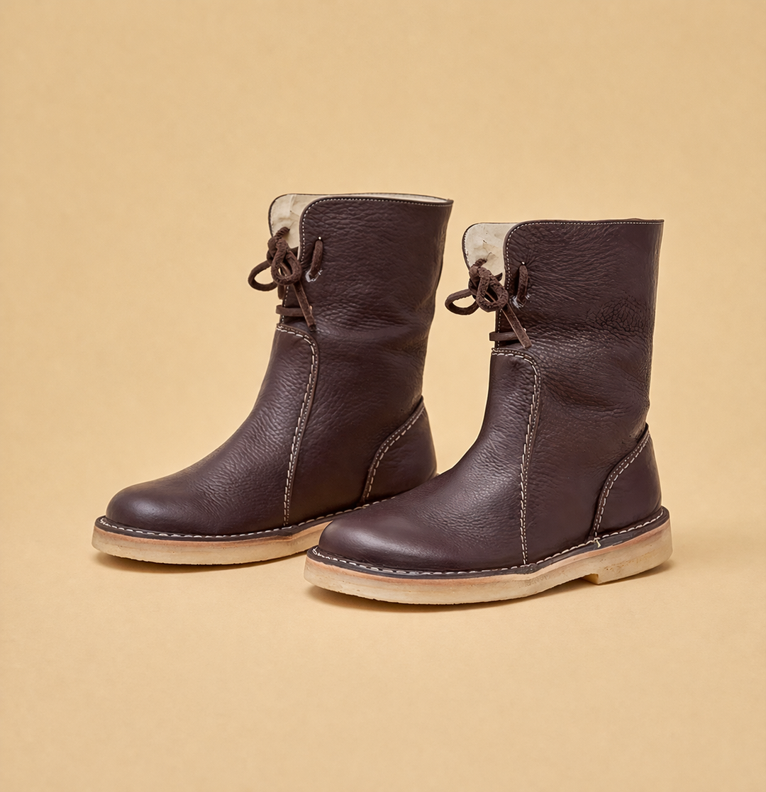 Protective women's warm short snow boots, designed for winter, cold weather, and outdoor activities.