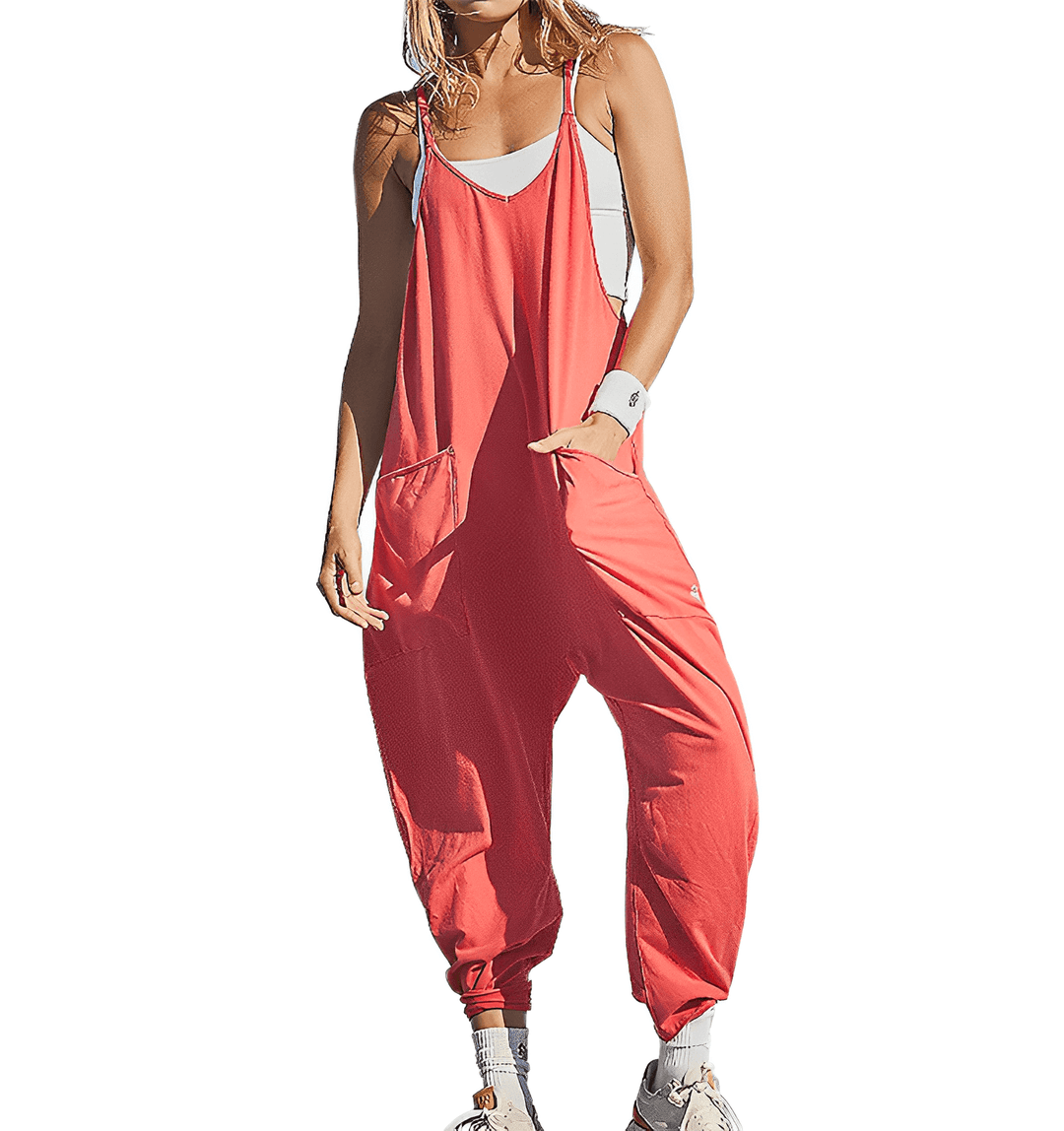 Model wearing a women's sleeveless jumpsuit with pockets, showcasing relaxed fit.