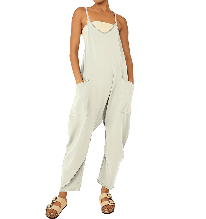 Back view of women's chic sleeveless jumpsuit. Versatile, comfortable summer fashion.